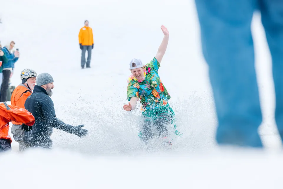 A skier pond skimming at an event at Whiteface Mountain.