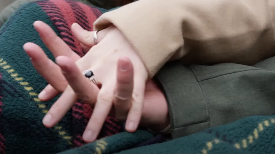 picture of a man and woman holding hands