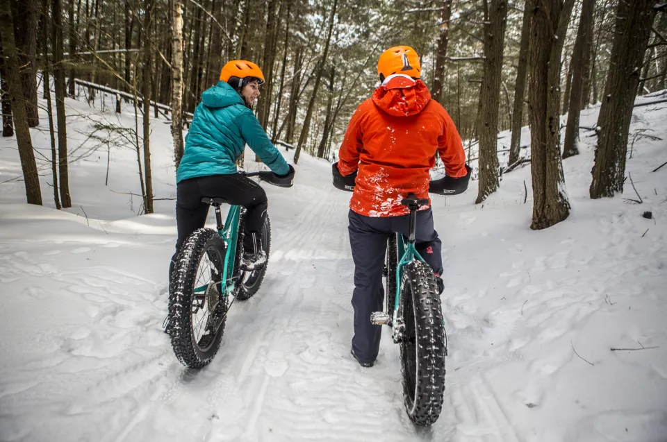 Fat tire biking through the woods.