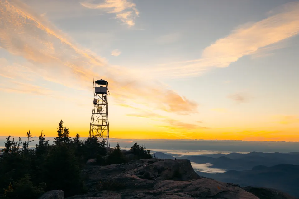 Hurricane Mountain fire tower at sunset.