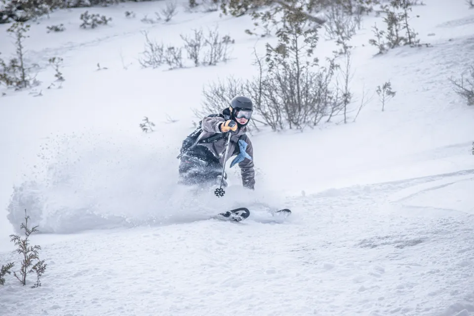 A skier backcountry skiing in Lake Placid.