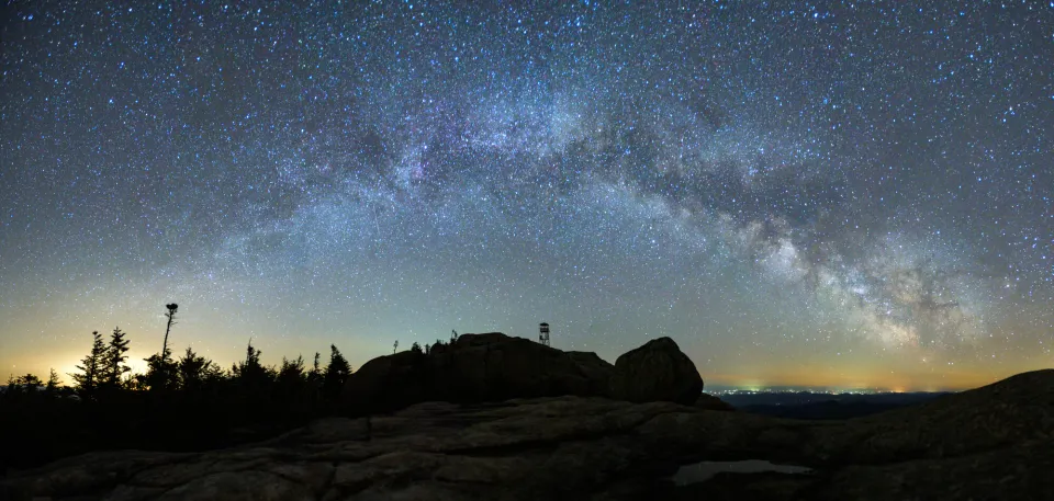 A panoramic view of the starry night sky.
