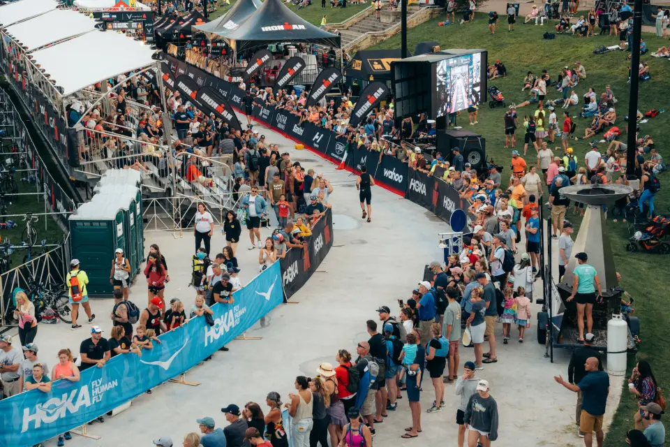 A race route in the middle of a crowd.