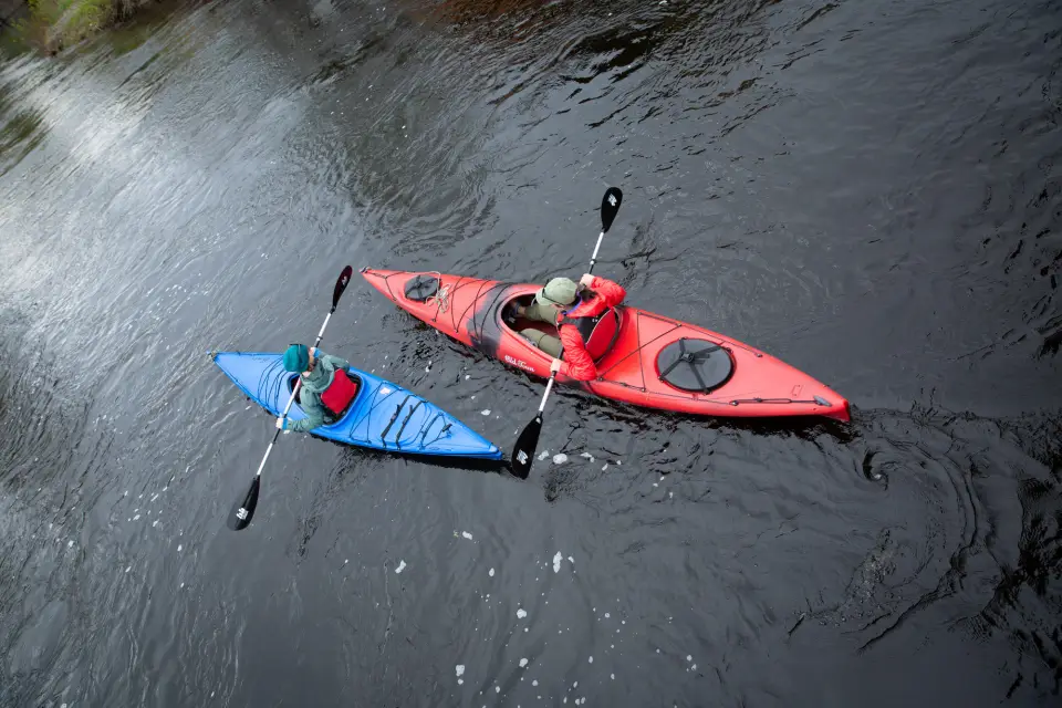 Two kayakers on the water.