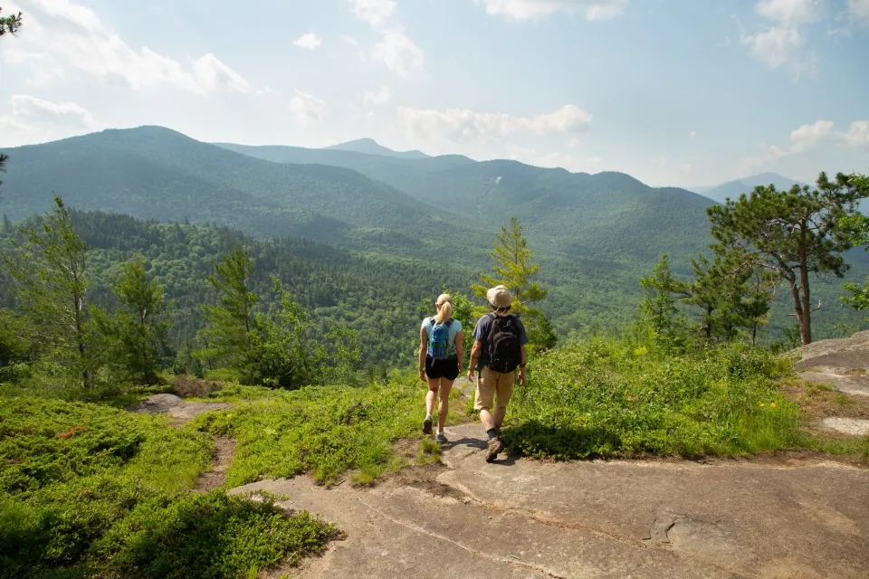 Two people near the summit of Baxter Mountain.
