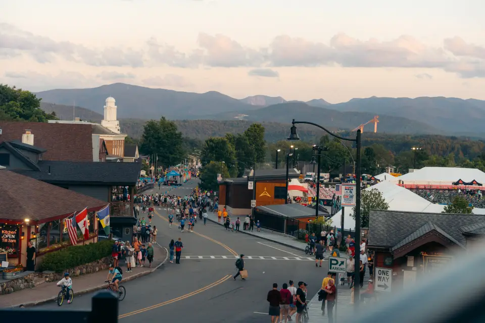A downtown in the evening during a race event.