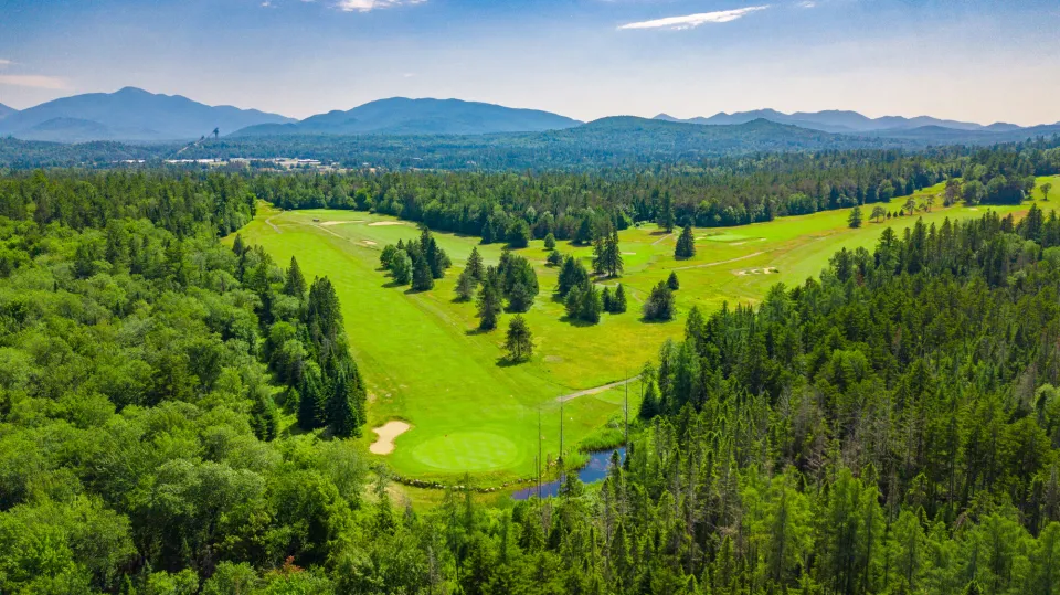 An aerial view of Lake Placid golf courses in the summer.